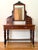 Circa 1850s Victorian dressing table or writing desk with drawers and mirror. Original silver-colored handles are a rare...
