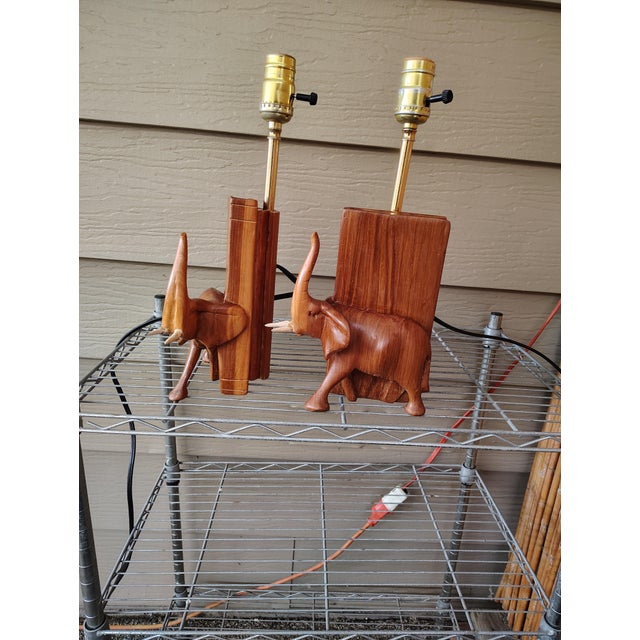 All offers considered 1950's African hardwood table lamps a pair .originally were bookends they were wired refinished to...