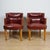 A pair of art deco armchairs by harry & lou epstein. Burr walnut veneered with carved detail to arms. Chestnut leather re-...