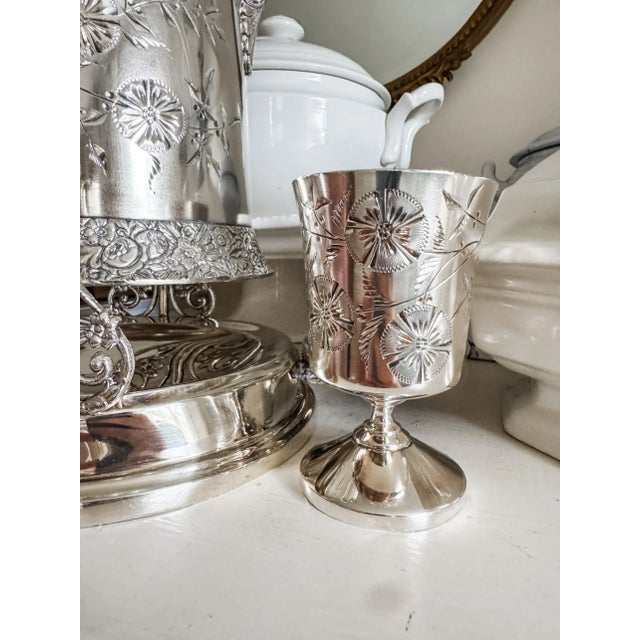 A magnificent, monumental Victorian quadruple plate water service by C.B. Barker Manufacturing Company of Meriden,...