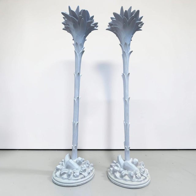 Stunning pair of Art Deco torchere floor lamps in the manner of Serge Roche. This fabulous pair of Hollywood Regency style...