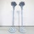 Stunning pair of Art Deco torchere floor lamps in the manner of Serge Roche. This fabulous pair of Hollywood Regency style...