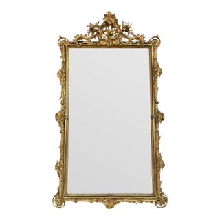 19th Century French Louis XV Carved and Giltwood Mirror With Crest For Sale