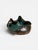 A glazed ceramic bowl by Gene Farkus, formed in an organic freeform shape with a folded, undulating rim. The interior is...