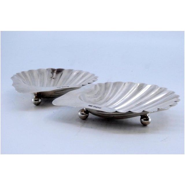 Shell-Shaped Silver Ringlets with Round Feet, Set of 2, in Very Good conditions. Designed 1890 to 1919 This piece has an...