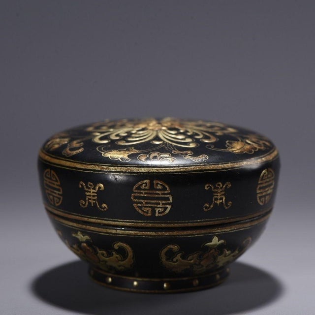 This elegant vintage trinket box is a beautiful example of traditional lacquerware. Crafted with a wood core, the circular...