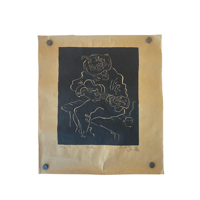 A striking limited edition linocut print titled Luta by contemporary artist Belsky. This expressive black-on-tan print...