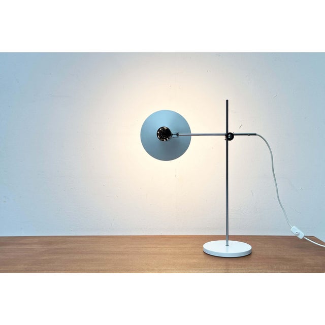 Minimalist table lamp from the renowned manufacturer Kaiser Leuchten. The design is clean and functional. The shade is...