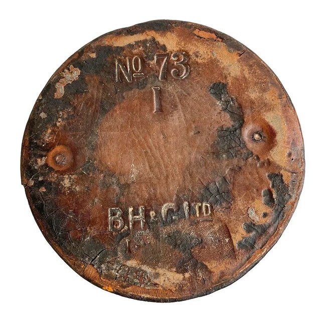 Antique 19th century English leather fire bucket with coat of arms crest. Makers stamp in bottom.