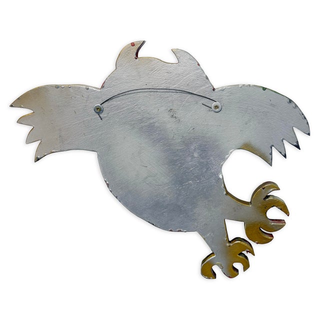 This signed mixed media hanging folk art owl by Pat Custer Denison showcases a playful, expressive interpretation of form...