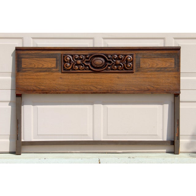 Twin-size headboard with carved Victorian-style detailing and a gently shaped silhouette. The design features a central...