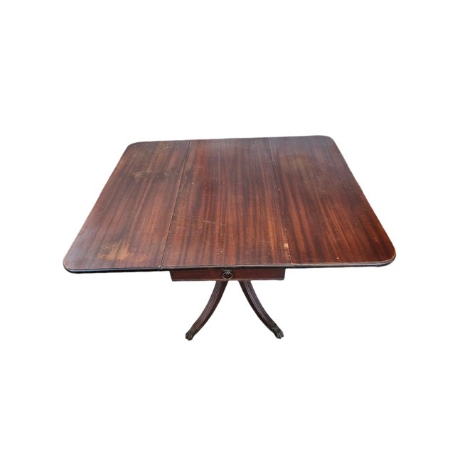English Antique Duncan Phyfe Mahogany Drop-Leaf Pedestal Table With Brass Feet For Sale - Image 3 of 5