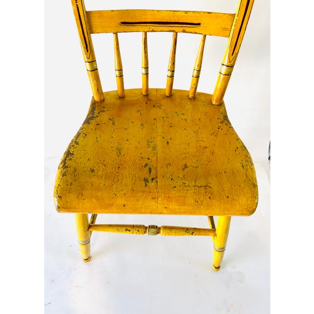 Vintage Country (Made in USA) Mustard Color and Stenciled, Plank Dining Chairs with authentic wear by use. 1940s