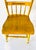 Vintage Country (Made in USA) Mustard Color and Stenciled, Plank Dining Chairs with authentic wear by use. 1940s