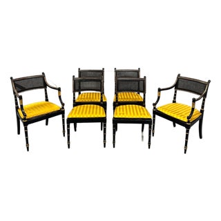 Late 20th Century Set of Six Baker Furniture Regency Ebonized and Parcel Gilt Cane Dining Chairs For Sale