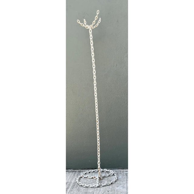 Crafted from robust, heavy-gauge iron, this striking vintage coat rack embodies a purely utilitarian yet sculptural...