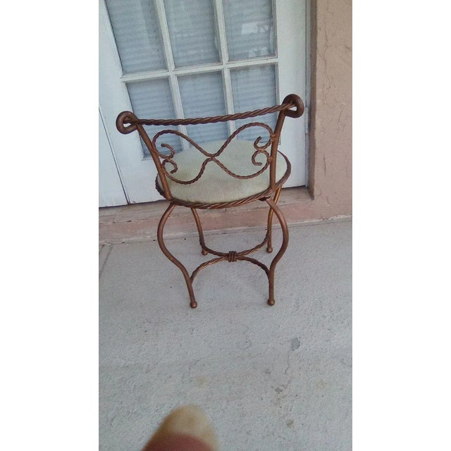 Hollywood Regency Wrought Iron Tassel Rope Swivel Vanity Chair Upholstered Seat Style: Traditional Color: Brass...