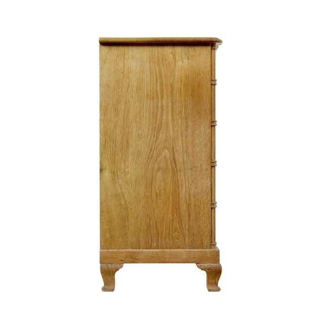 mid century baroque revival solid oak chest of drawers circa 1950. we are pleased to offer this striking chest of drawers...