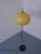 Floor lamp from the 1970s. The lampshade is height-adjustable and made of plastic. When switched off, the lampshade is...