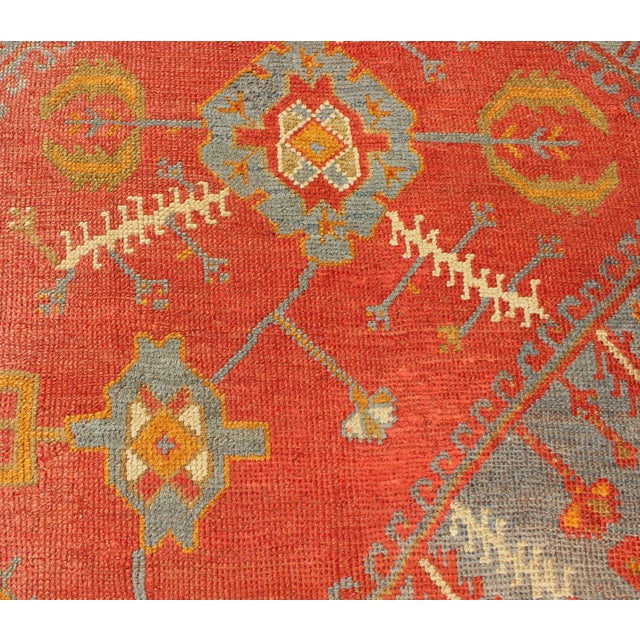Textile Antique Turkish Oushak Rug With Tribal Medallion Design in Terracotta and Blue 10'0 X 13'8 For Sale - Image 7 of 12