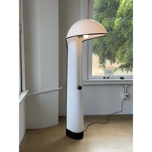 Alba floor lamp by Sergio Brazzoli & Ermanno Lampa for Harvey Guzzini, 1970s. Plastic housing with metal base.