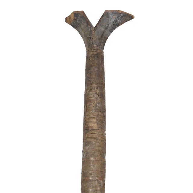 An abstract post or bed support from the Nupe. This post may have been used as one of four-bed net supports found in most...