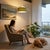 The Stretch Arc Lamp is a modern design by Kirby Groce, featuring a striking architectural silhouette that serves as a...