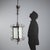 Wrought iron lantern chandelier featuring an elegant design of curls and volutes, typical of early 19th-century Italy. It...