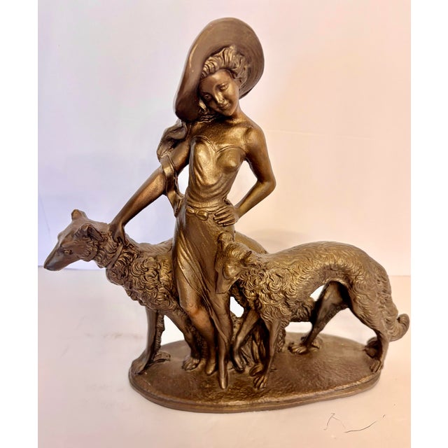 During the 1920's, the Art Deco period, high class women wearing a long flowing dress in the French countryside would be...