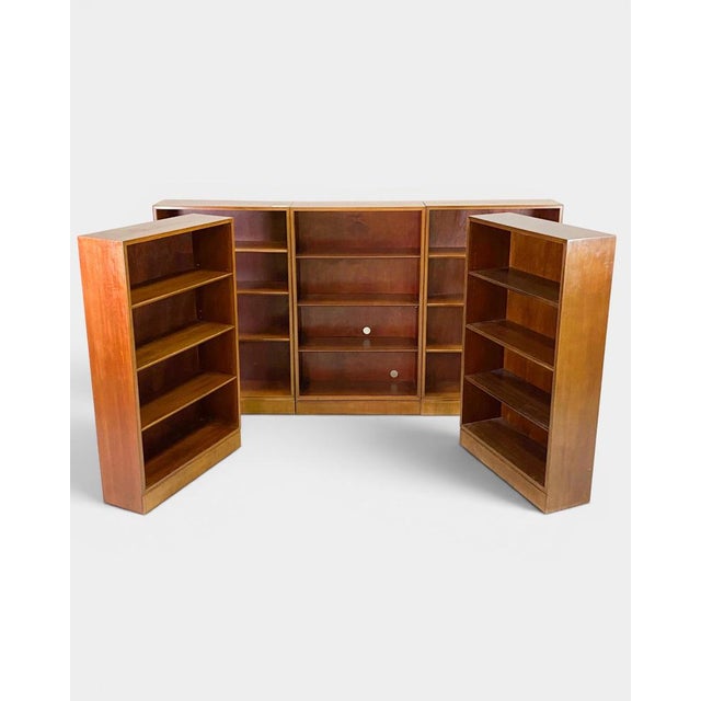 Exceptional set of five mahogany bookcases designed by renowned Danish cabinetmaker and designer Frits Henningsen. Crafted...