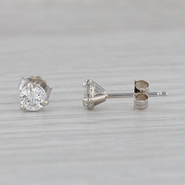 Gemstone Information: - Natural Diamonds - Total Carats - 0.39ctw Cut - Round Brilliant Color - H - I Clarity - VS2 Metal:...