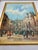 Street scene painted on canvas of Italian plaza. Vintage circa 1960s. Gold wood frame. Signed lower left.