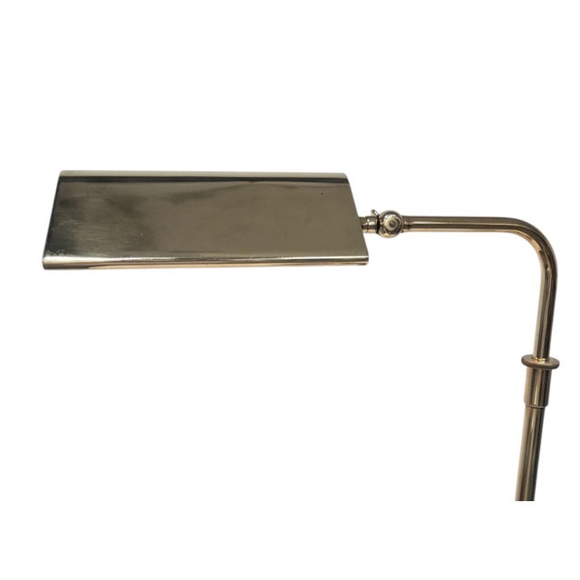 Exquisite height-adjustable table or floor lamp, designed by renowned designer Florian Schulz for Interline in the 1970s....