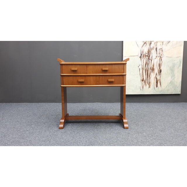 Elegant Art Deco sewing table with 4 drawers. Made of solid walnut. In very good and beautiful original condition. A fine...