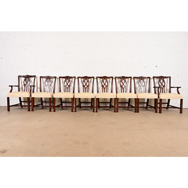 A gorgeous set of eight Georgian or Chippendale style dining chairs By Kindel Furniture USA, 1980s Solid carved mahogany...