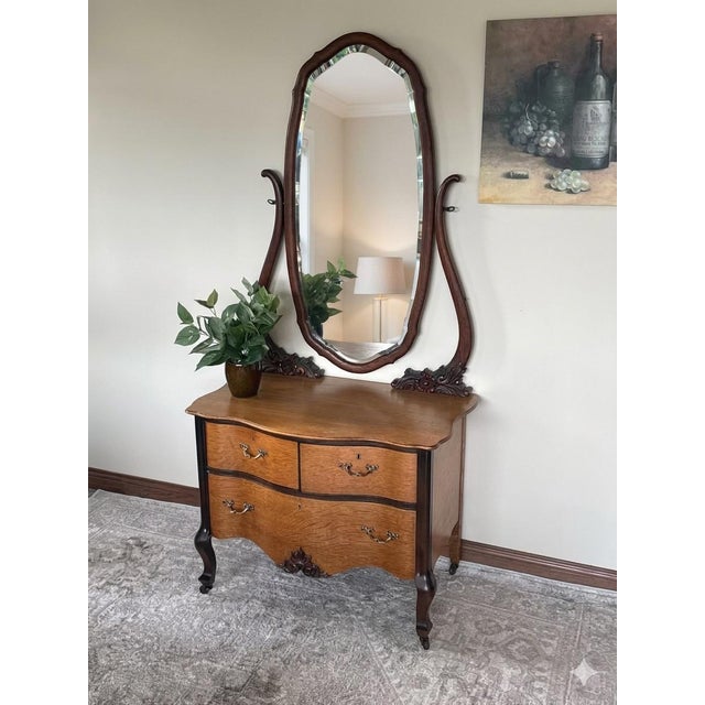 Elevate your space with this breathtaking, fully restored antique serpentine princess dresser, meticulously brought back...