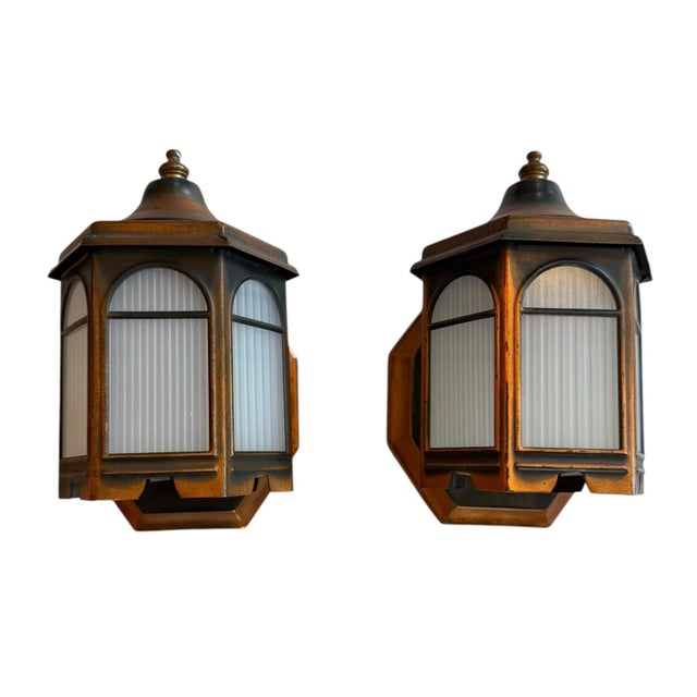 This is a great pair of mid century wall sconces. Perfect for a covered porch in any style home. From farmhouse to...