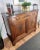 Very elegant Italian chest of drawers, with 3 greatly carved drawers hidden behind the two doors. This commode cabinet is...