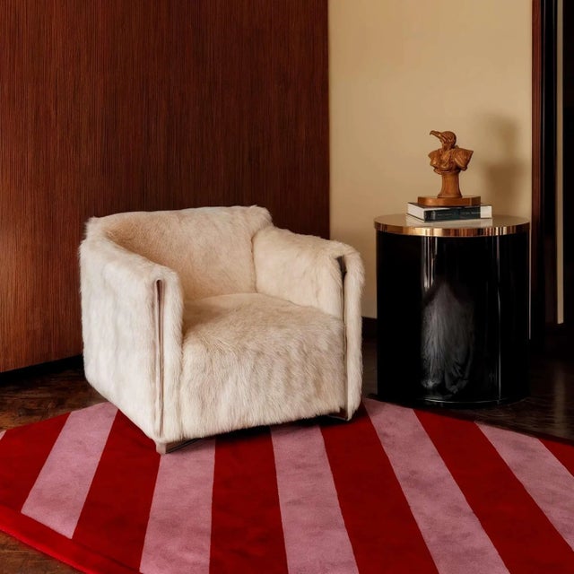 The Pink Candy Rug radiates sweetness and playful energy, with stripes of candy pink and vibrant red. This bold...