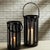 This cast aluminum hurricane has a great presence. Strong and sturdy, it makes a solid accent. The seeded glass insert, it...