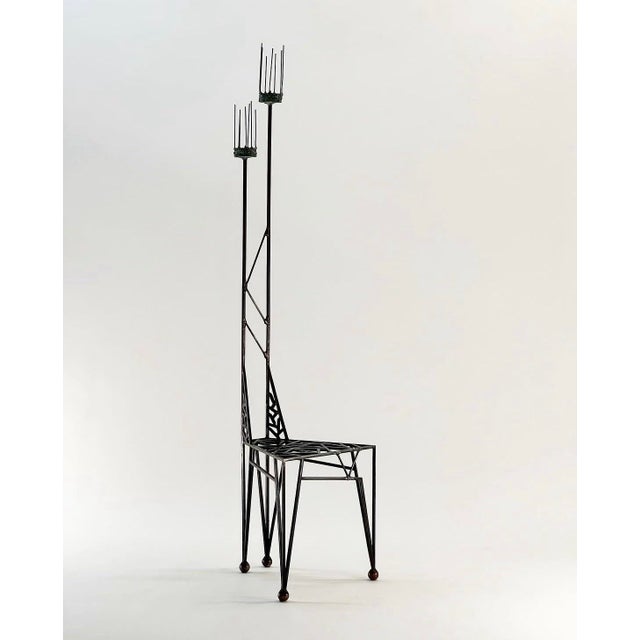 One of my longtime prized possessions! I bought this beautiful artist made iron sculpture chair with one of my first...