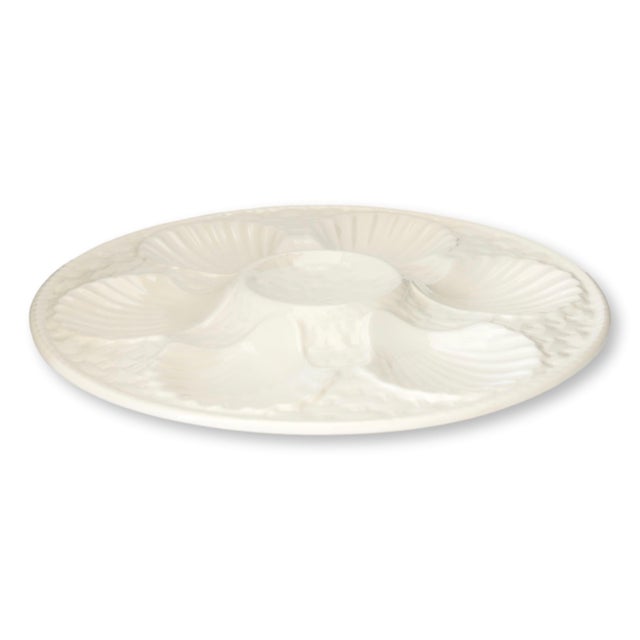 Set of six mid 20th century French oyster plates manufactured by Chantilly France in the early 1960s. Finished in crisp...
