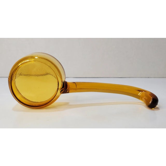 Color: Honey Amber Manufacturer: Tiffin Shape: Condiment Spoon