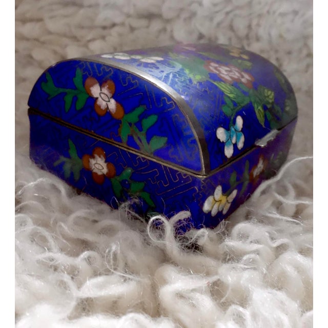 Domed, floral blue cloisonne trinket box, old, signed 'China'. Combination of the deep blue outside and the rich aqua...