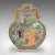 This is a large antique moon vase. A Chinese, ceramic decorative flower urn with hand-painted decoration, dating to the...