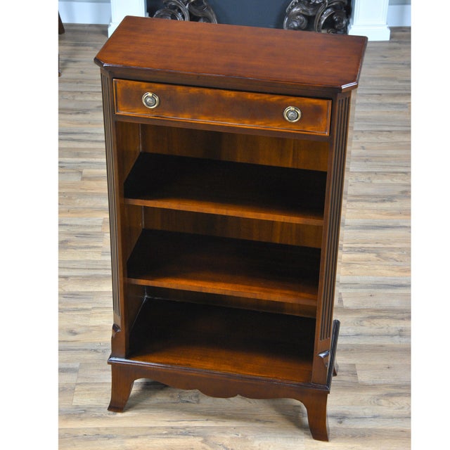 This petite sized Small Bookcase from Niagara Furniture features good vertical storage in a narrow space. The simple yet...