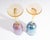A pair of art glass wine/goblet glasses by American artist Aaron Slater. One glass is pink and one blue with yellow twist...