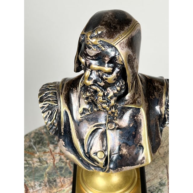 This finely modeled patinated bronze bust of Michelangelo is after a model by Albert-Ernest Carrier-Belleuse, created in...