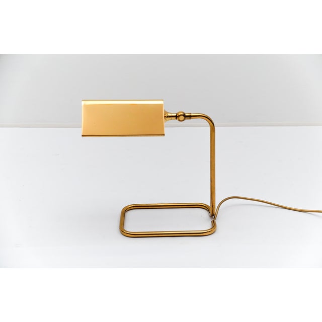 Adjustable Mid-Century Modern brass table lamp by Florian Schulz, 1960s Germany The lamp needs 1 x E27 Edison screw fit...
