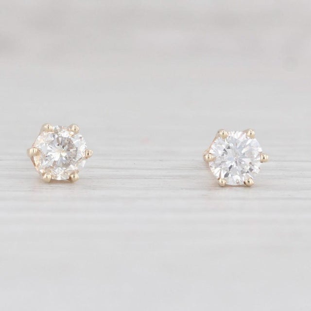 Gem: Natural Diamonds - 0.47 Total Carats, Round Brilliant Cut, H - I Color, SI2 - I1 Clarity Metal: 14k Yellow Gold...